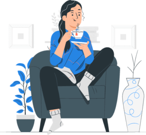 Woman sitting in a chair and drinking tea.